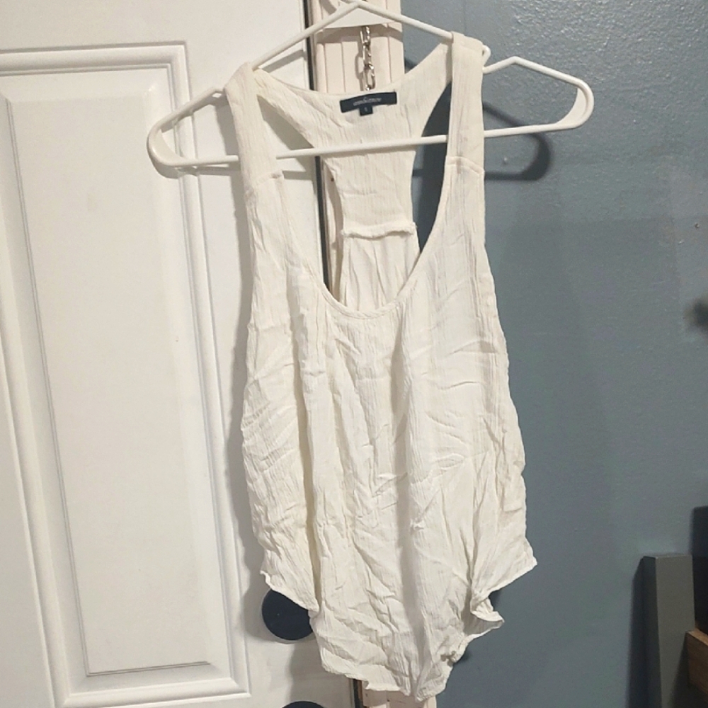 Ambiance White Sleeveless Backless Blouse